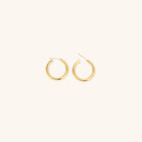Elegante brede runde øreringe | 18k guld