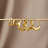 Luna Elegante Snoede Øreringe | 14k Guld